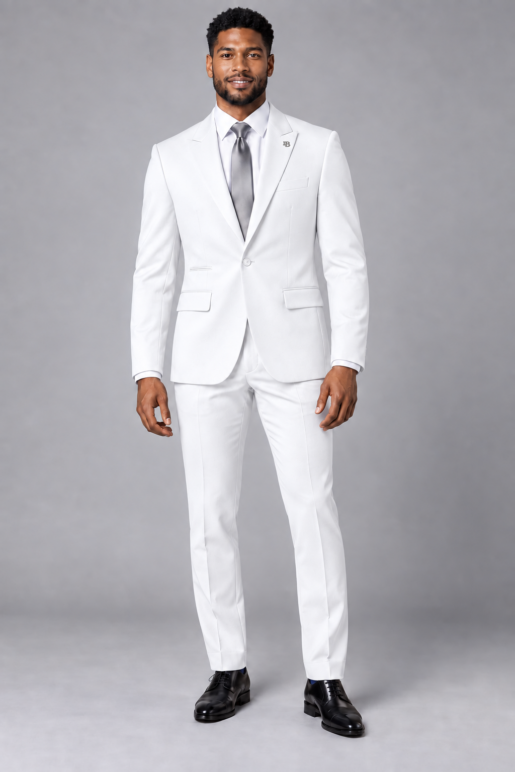 Barocco SU600 White slim fit two-piece suit on model with single-button notch lapel jacket