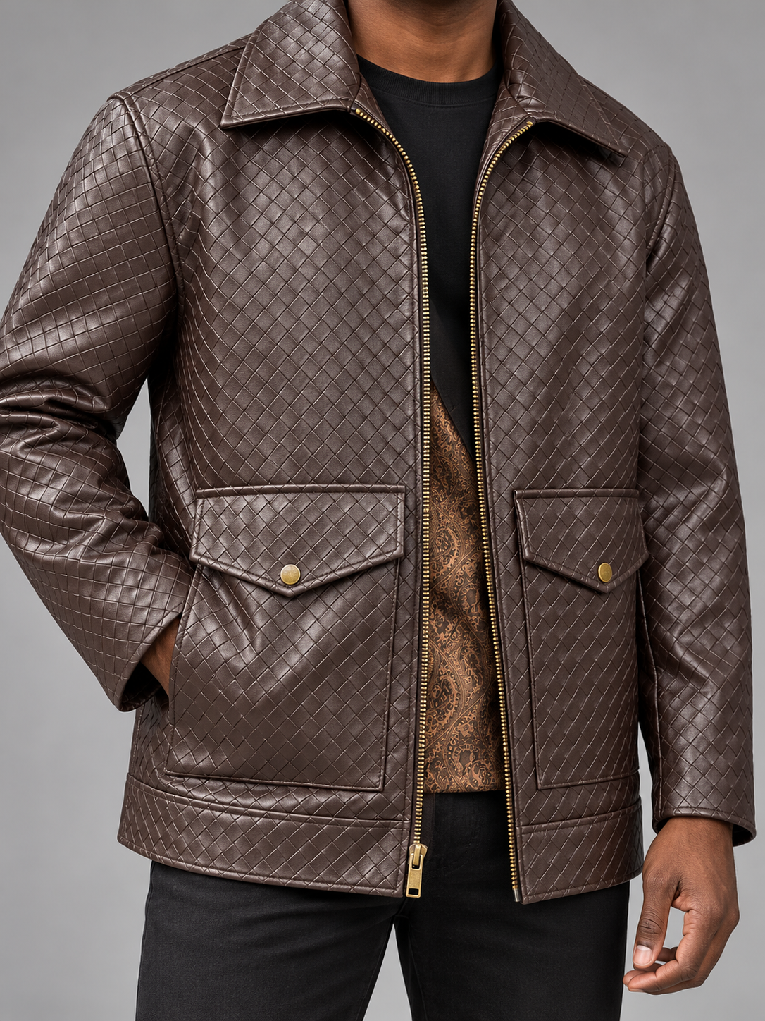 Espresso Manzini Caribbean jacket close-up showing lower snap-flap pockets, basketweave PU texture and paisley lining