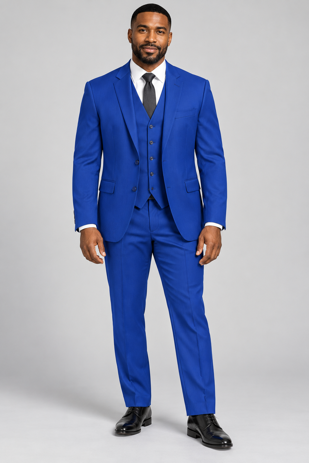 Model wearing the royal blue Pavaratti 203 modern-fit three-piece suit with matching jacket, vest and trousers