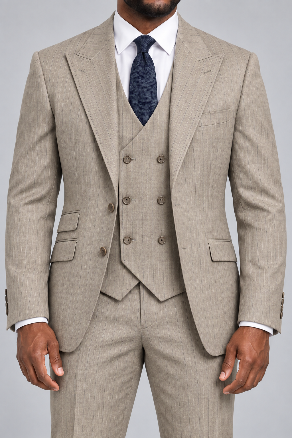 Saboo DB5200 Beige modern fit three-piece pinstripe suit — close-up of peak lapels, six-button double-breasted vest, stitching and fabric