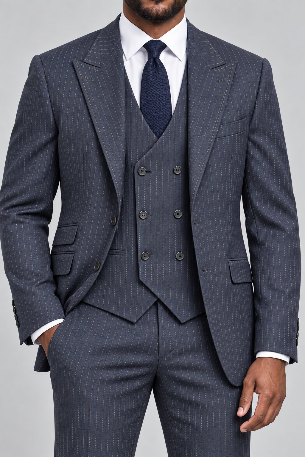 Saboo TA2 Navy modern fit three-piece pinstripe suit — close-up of peak lapels, six-button double-breasted vest, stitching and fabric