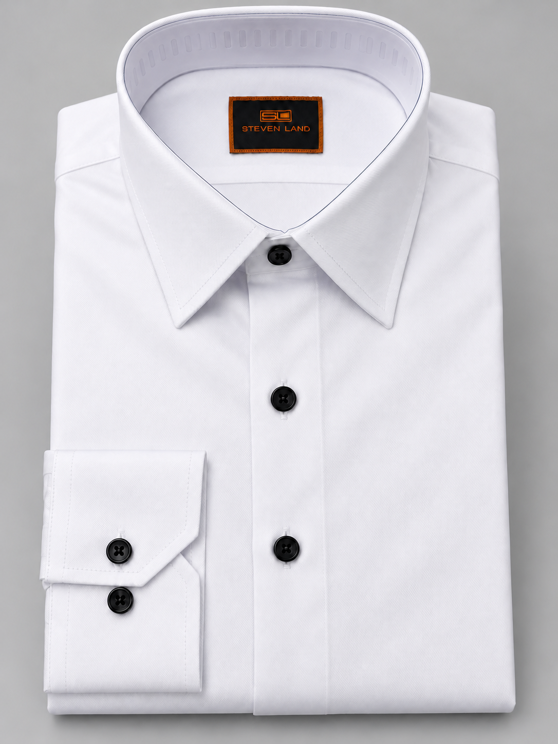 Steven Land DS467C white cotton dress shirt with black contrast buttons and button cuffs.