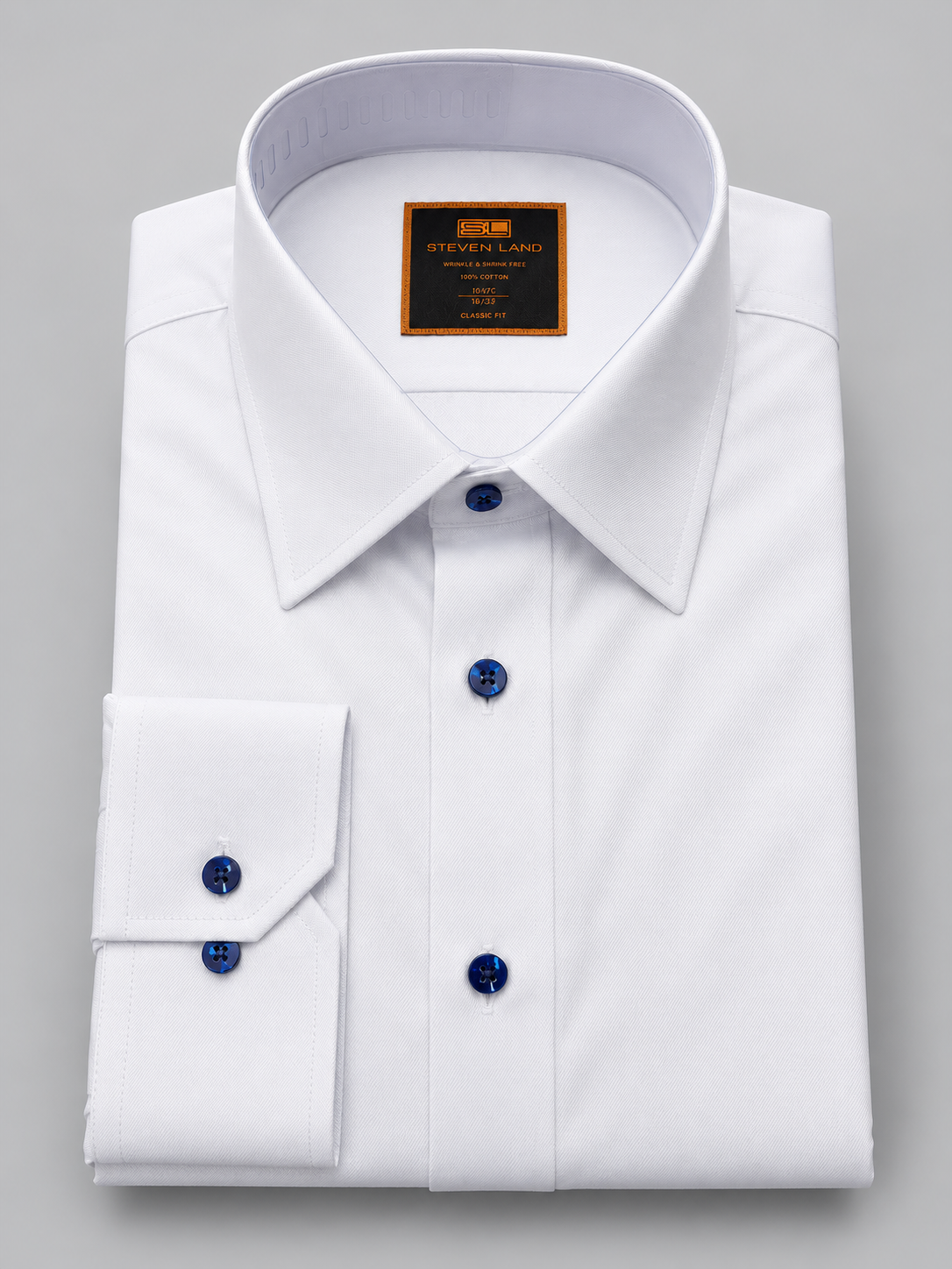 Steven Land DS467C white cotton dress shirt with navy contrast buttons and button cuffs.