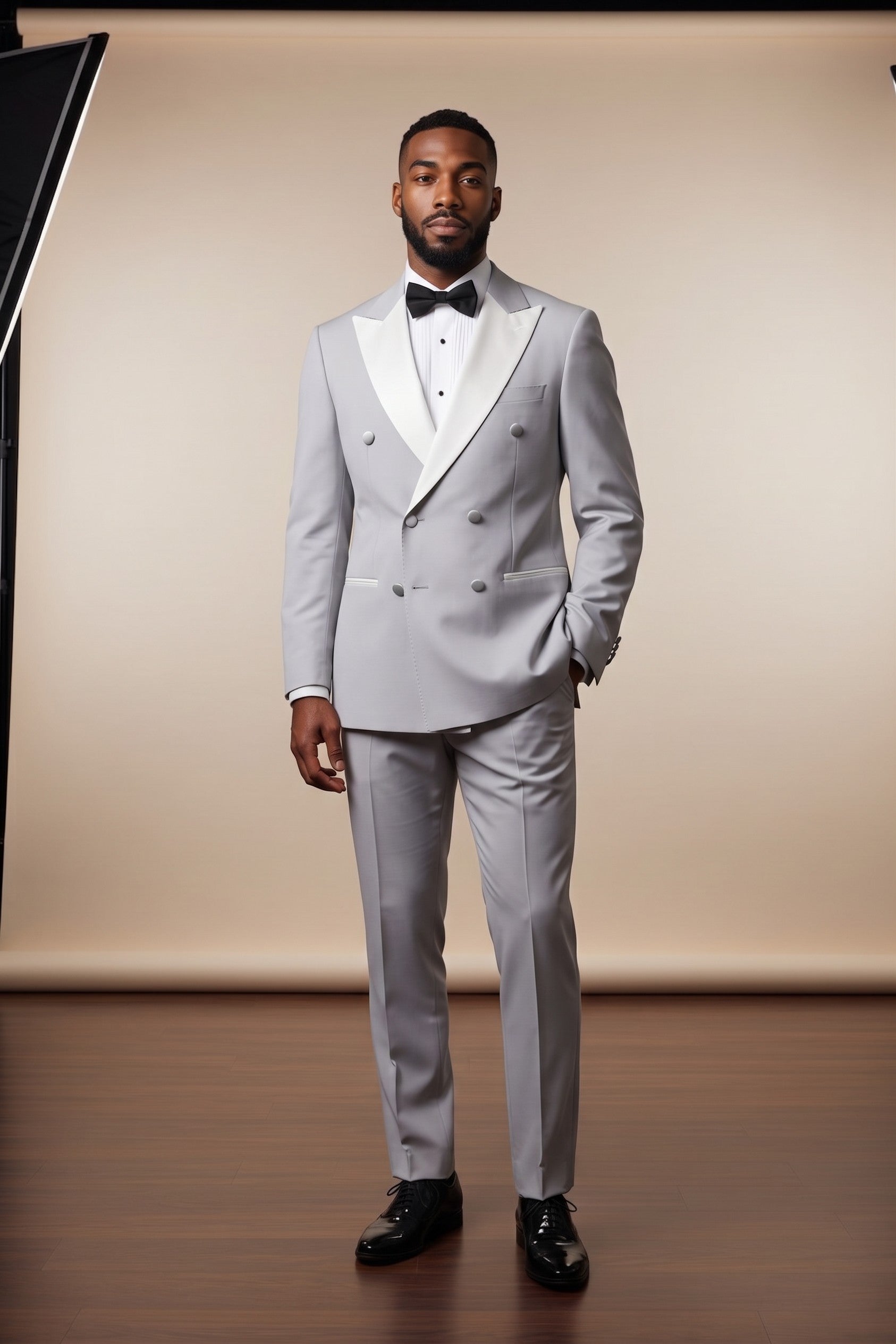 The City Warehouse-Menswear Marco Lorenzo silver double-breasted tuxedo with peak lapels and black bow tie