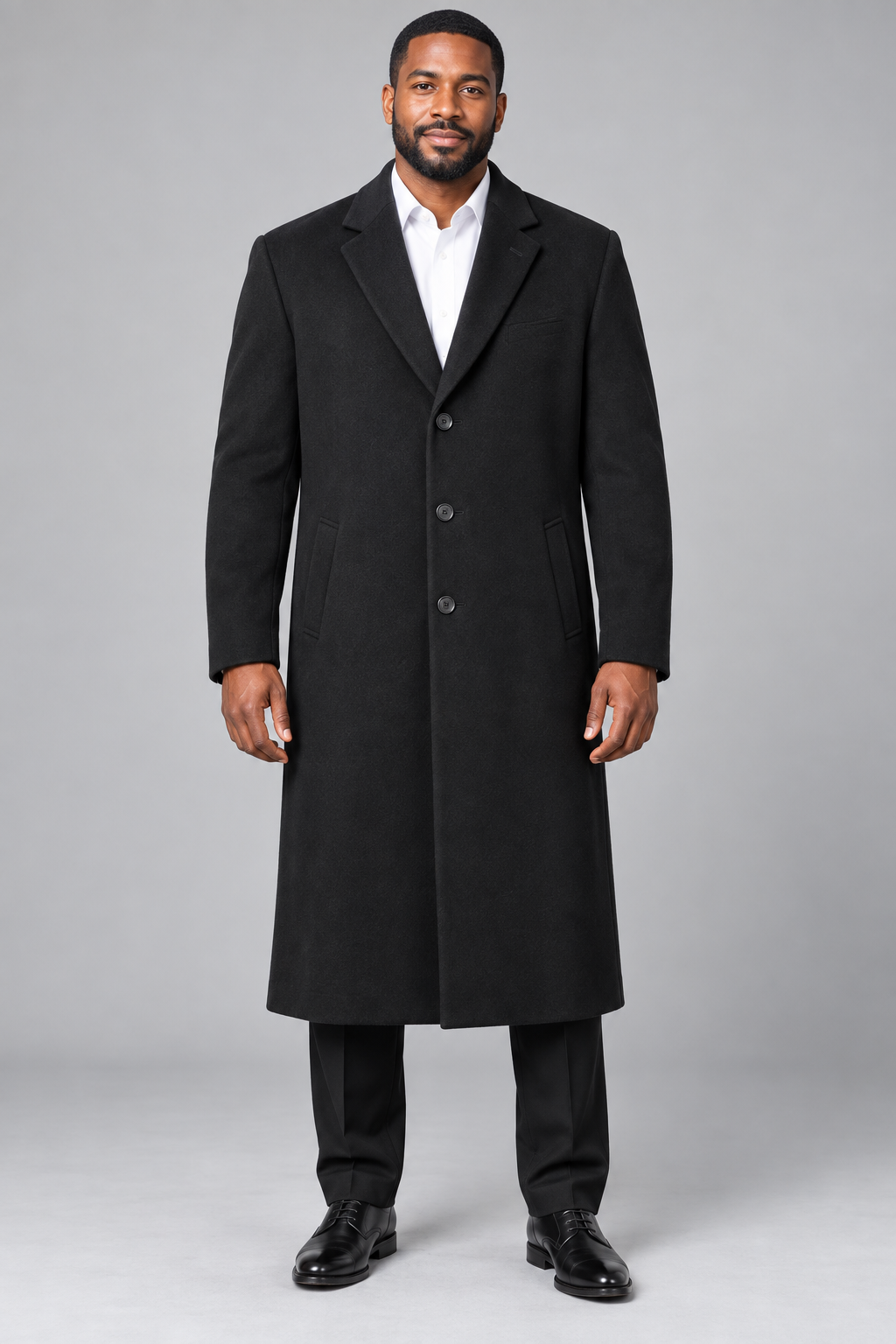 Vinci CL48 full-length coat in black, front view on model
