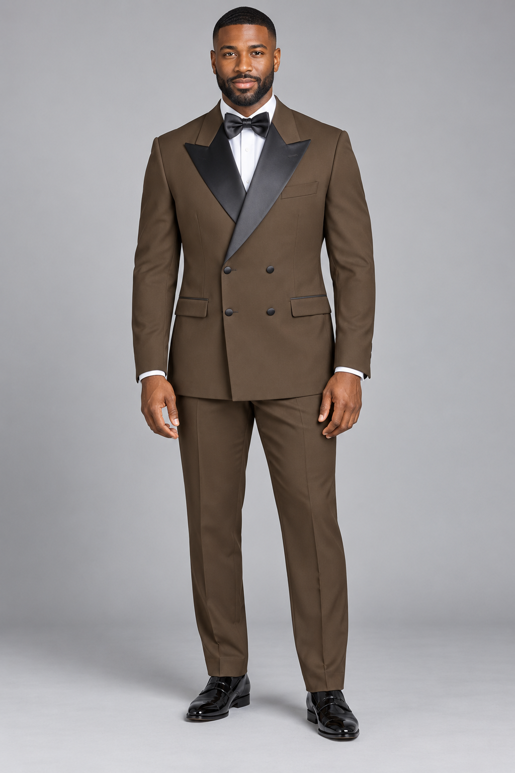 Vinci TDB-900 brown solid double-breasted tuxedo with pants and bow tie on a model
