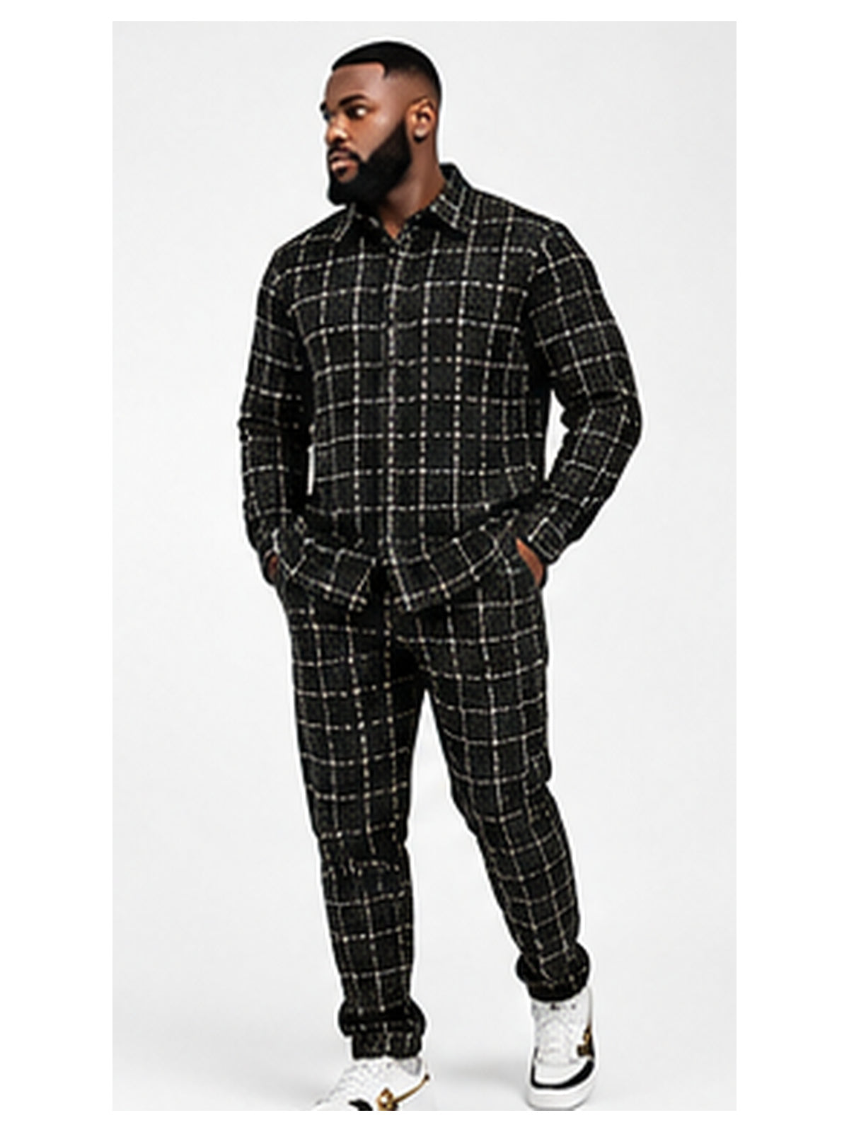 Black male model wearing black T.R TRST-513 matching textured two-piece set front view