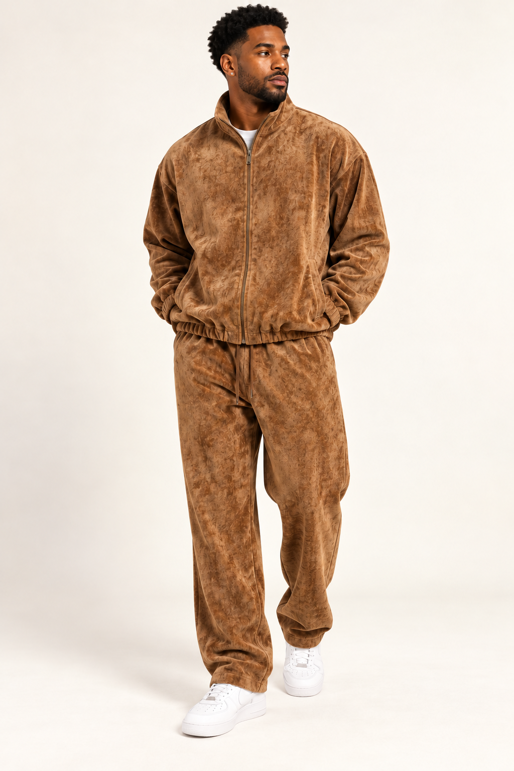 Insomnia Gold Label 2pc jogger set in warm Brown modeled front three-quarter, full-zip standing collar jacket and matching trousers