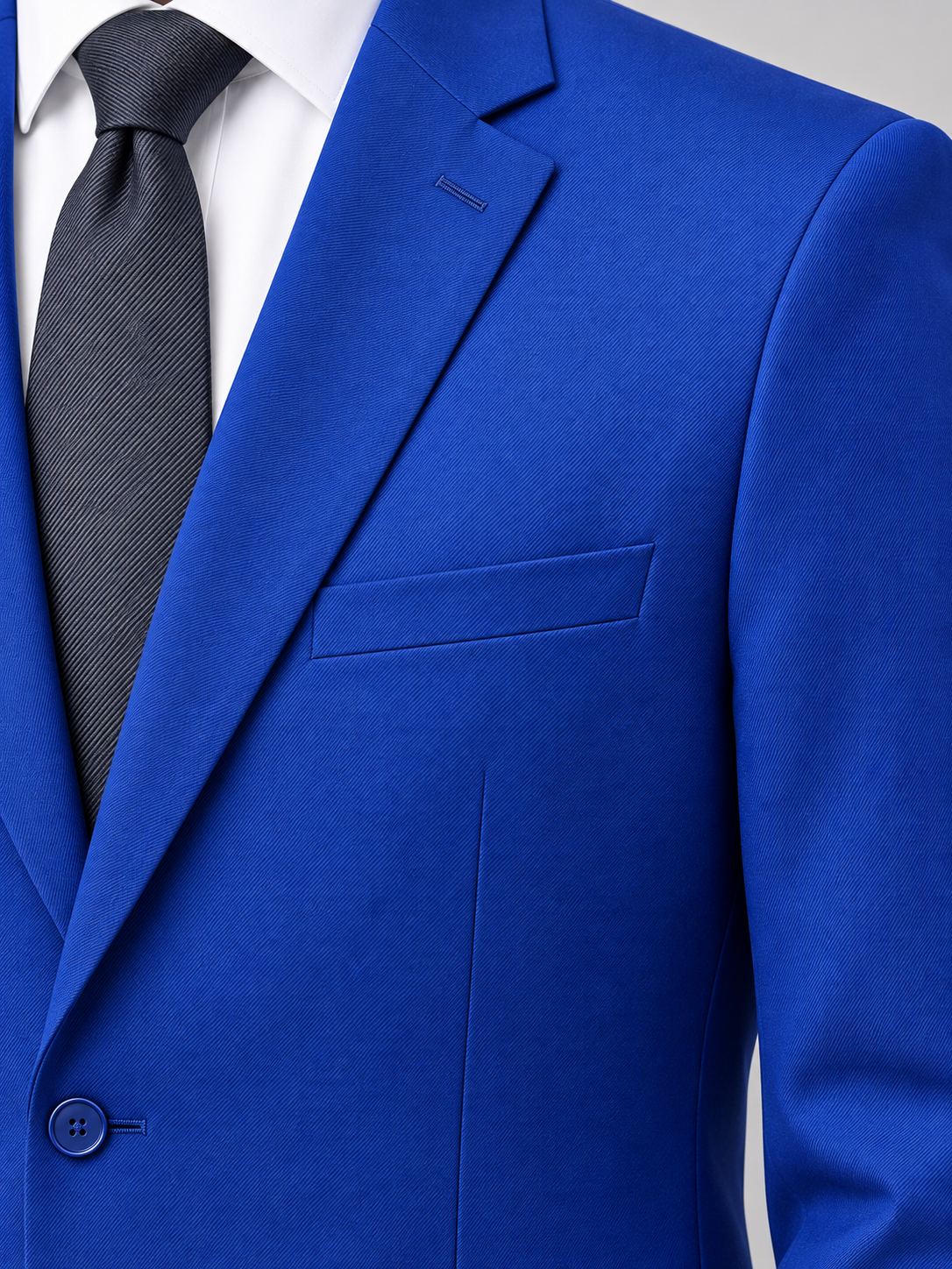 Close-up of the royal blue Pavaratti 203 modern-fit suit showing the notch lapel, chest pocket and fabric texture
