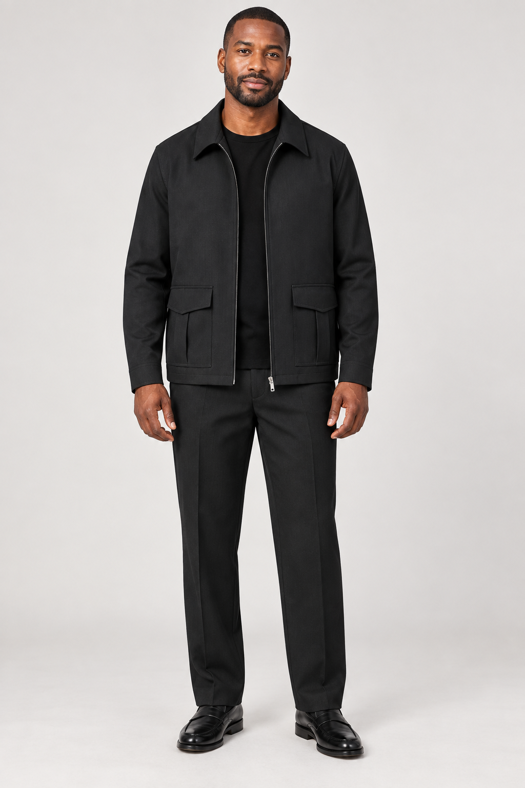 R. Lewis RLO20 Black jacket and matching pants walking set on a model