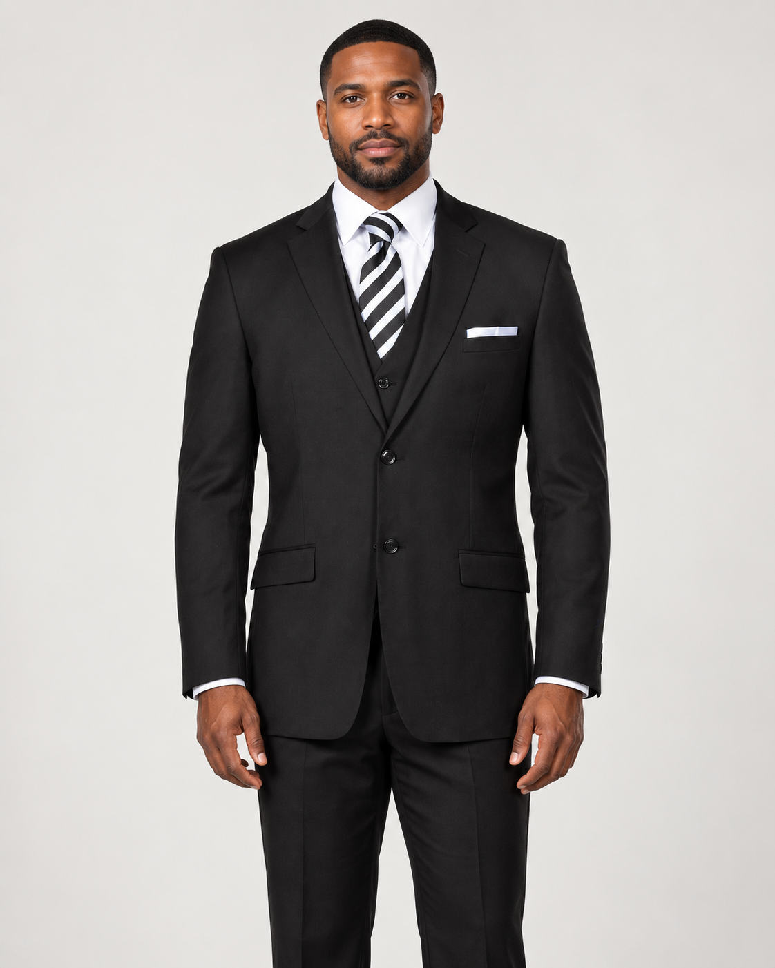Model wearing a black Retro Paris 203 St. Marcus modern-fit three-piece suit with a notch-lapel jacket, matching vest and trousers