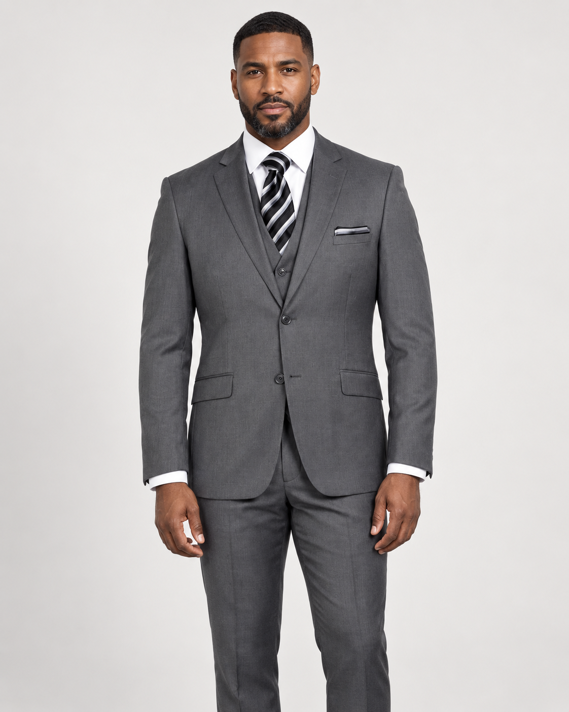 Model wearing a gray Retro Paris 203 St. Marcus modern-fit three-piece suit with a notch-lapel jacket, matching vest and trousers