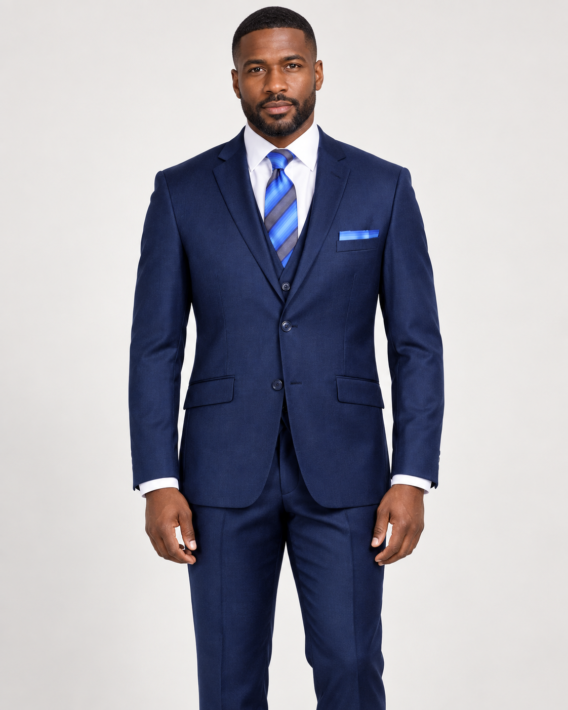 Model wearing a navy Retro Paris 203 St. Marcus modern-fit three-piece suit with a notch-lapel jacket, matching vest and trousers