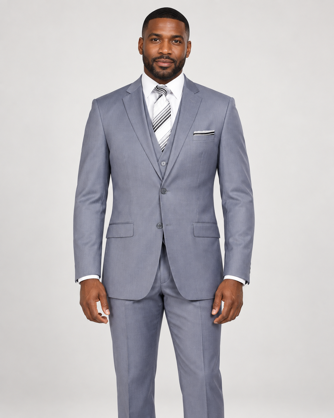 Model wearing a silver Retro Paris 203 St. Marcus modern-fit three-piece suit with a notch-lapel jacket, matching vest and trousers