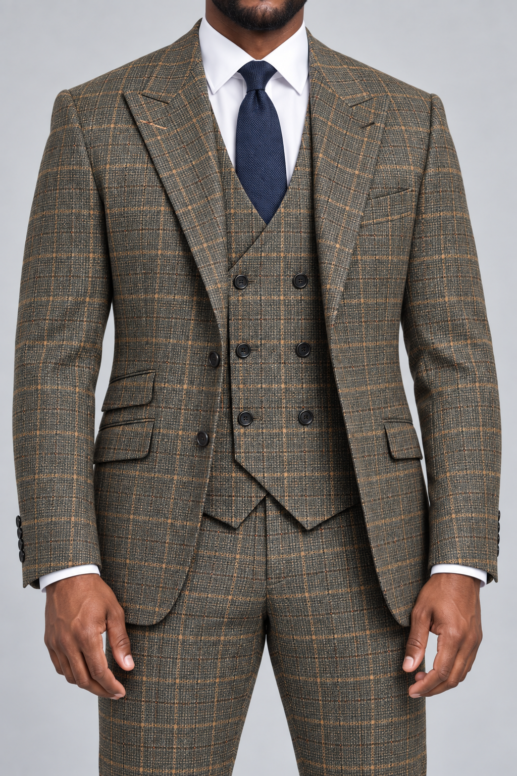 Saboo 1950 Olive modern fit three-piece plaid suit — close-up of peak lapels, six-button double-breasted vest, stitching and fabric