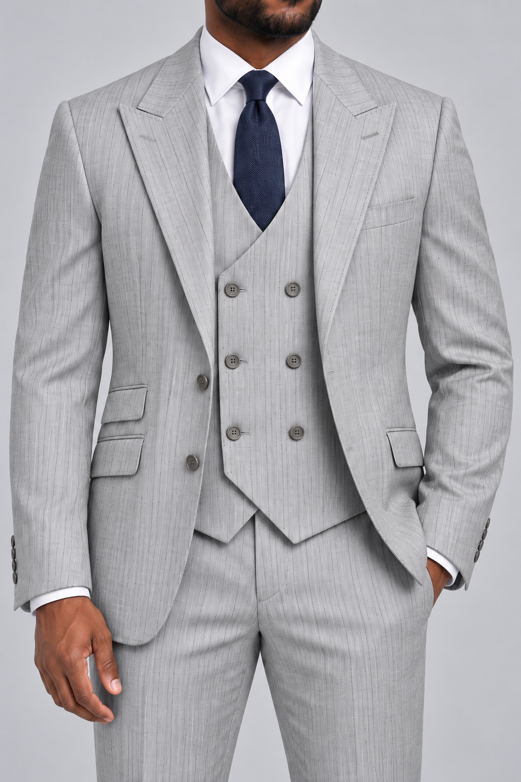 Saboo ATA09 Silver modern fit three-piece pinstripe suit — close-up of peak lapels, six-button double-breasted vest, stitching and fabric