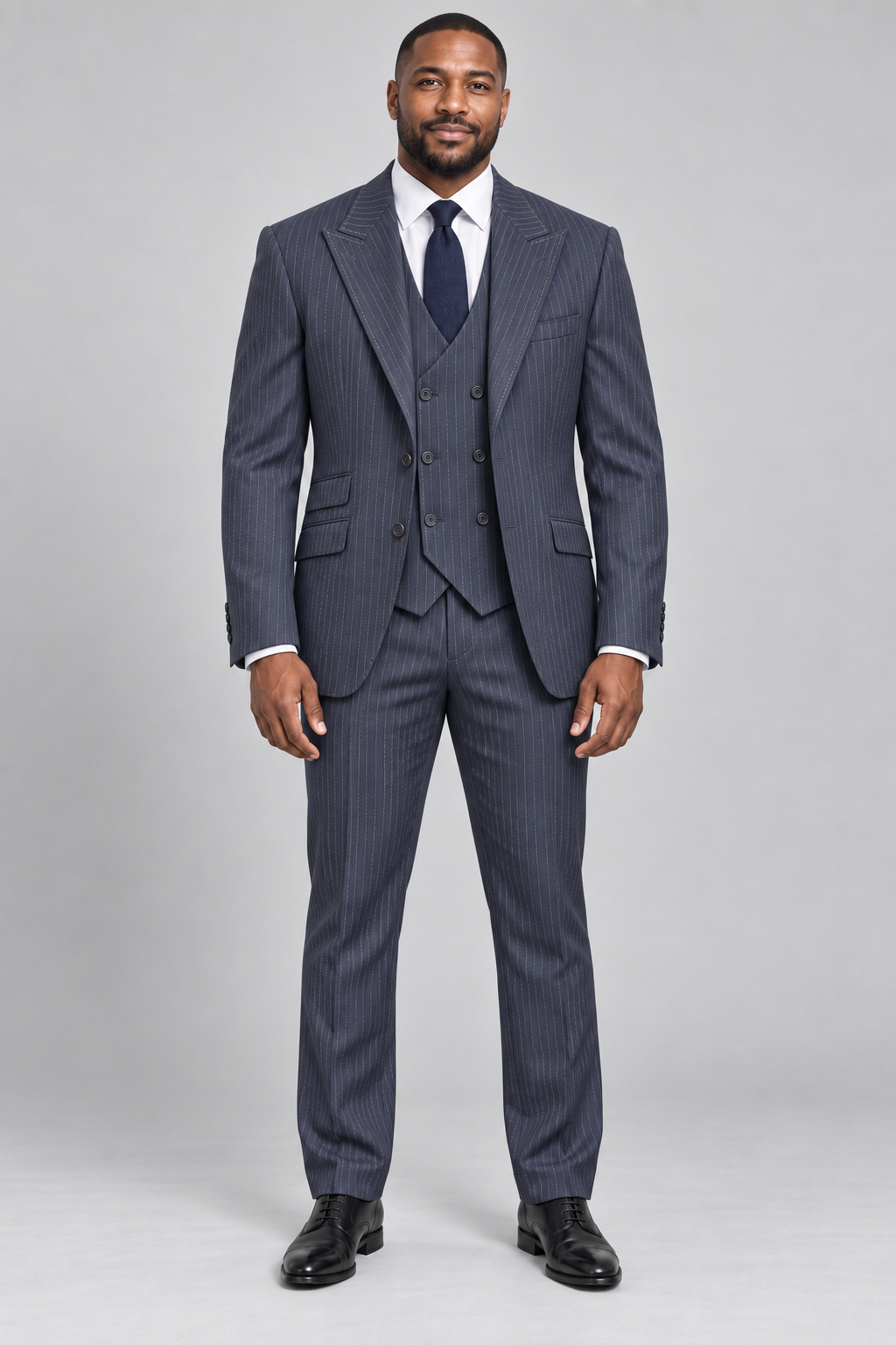 Saboo TA2 Navy modern fit three-piece pinstripe suit — full-length front view with peak lapels and double-breasted vest