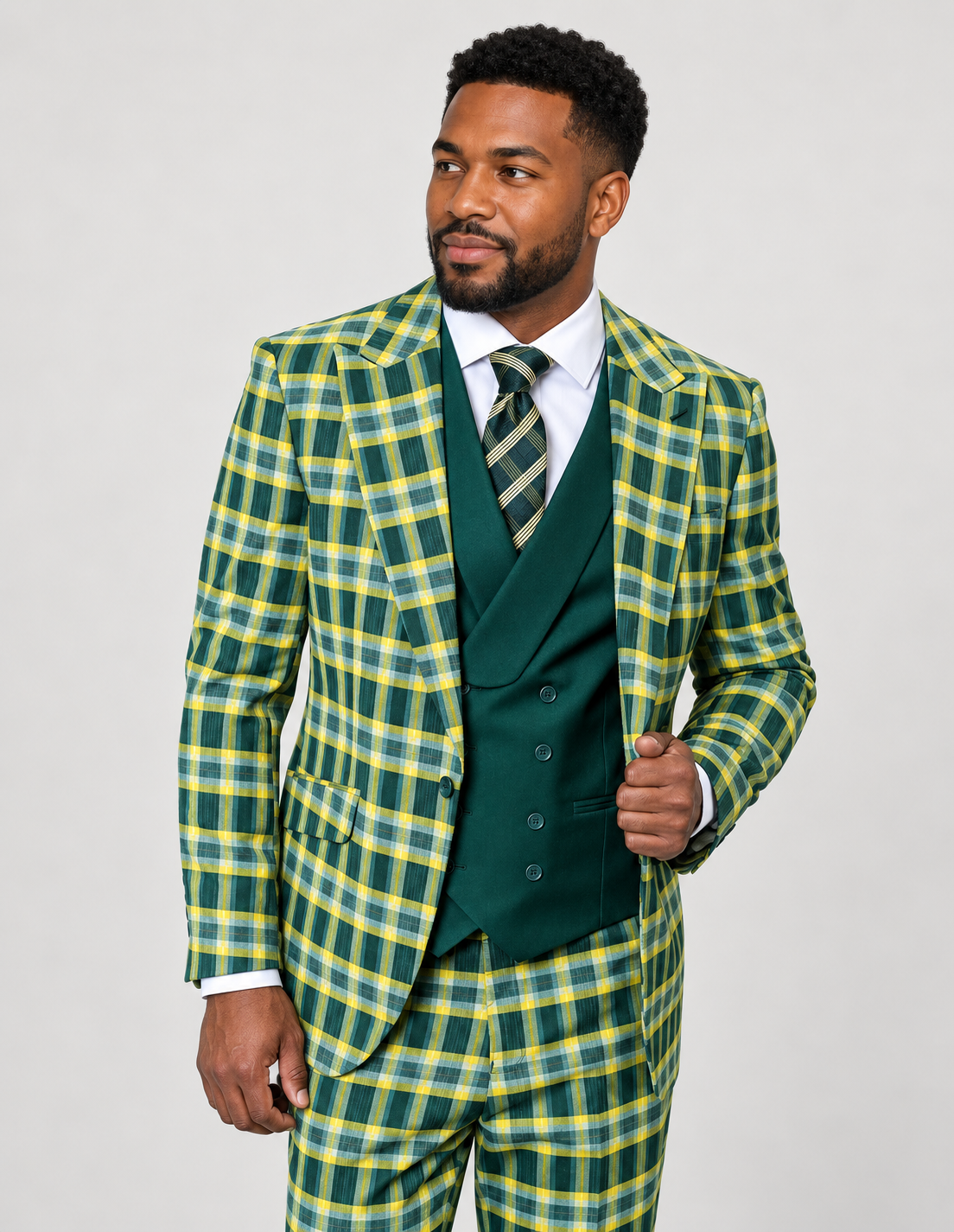 Saboo Terry hunter green plaid three-piece wool suit with matching trousers and a contrasting solid shawl-collar double-breasted vest, shown on a model