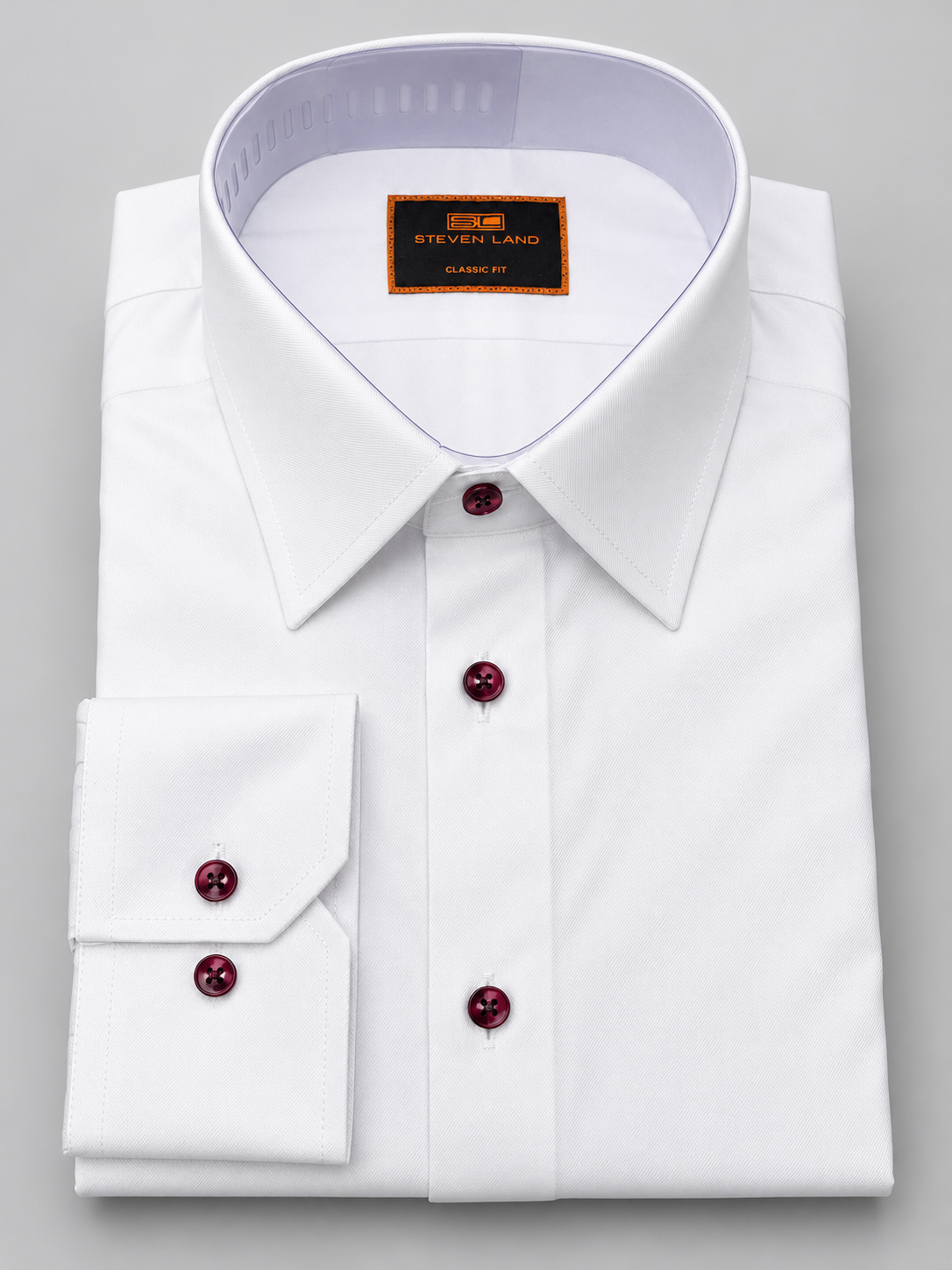 Steven Land DS467C white cotton dress shirt with burgundy contrast buttons and button cuffs.