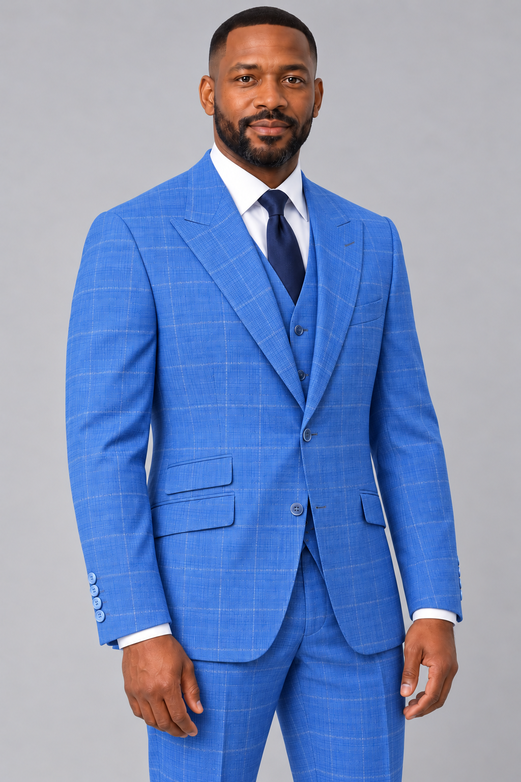 Saboo 8011 Ocean Blue three-piece suit, three-quarter front view with subtle whitish windowpane, peak lapels and regular vest
