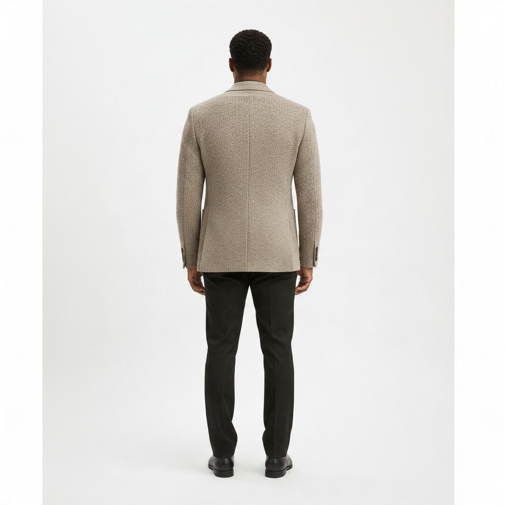 Back view of The City Warehouse-Menswear beige slim fit stretch wool-blend blazer on a model with black trousers.