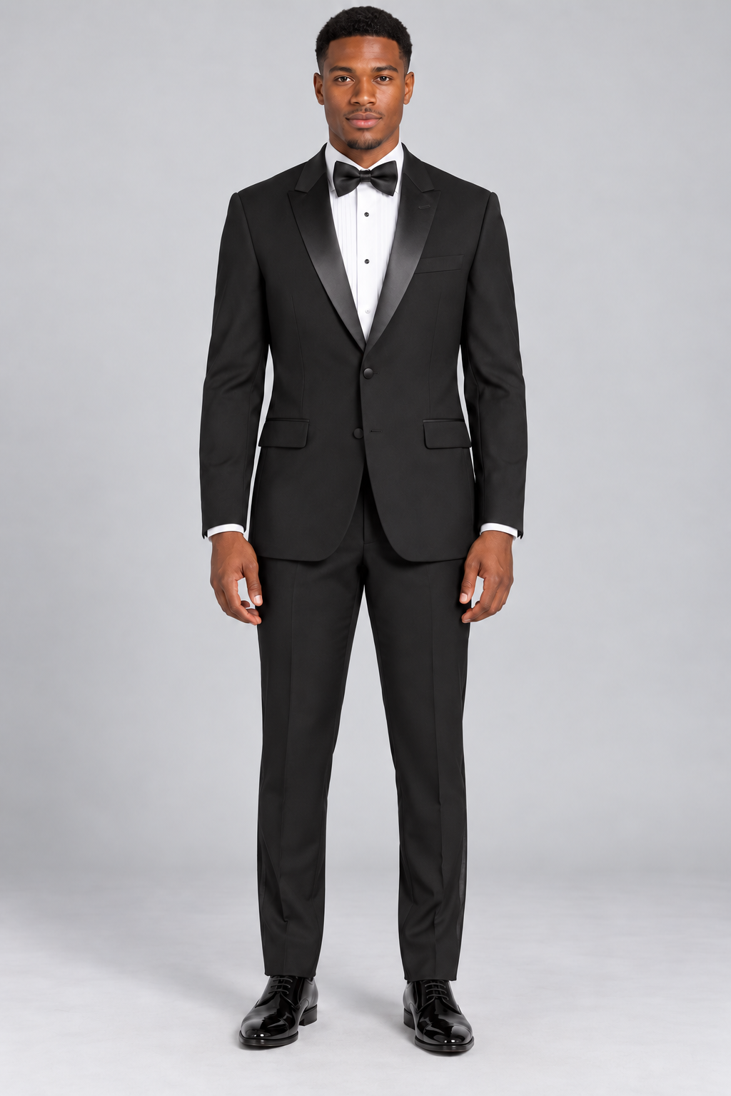 Vinci T-SC900 black slim fit two-piece tuxedo with satin notch lapels on model