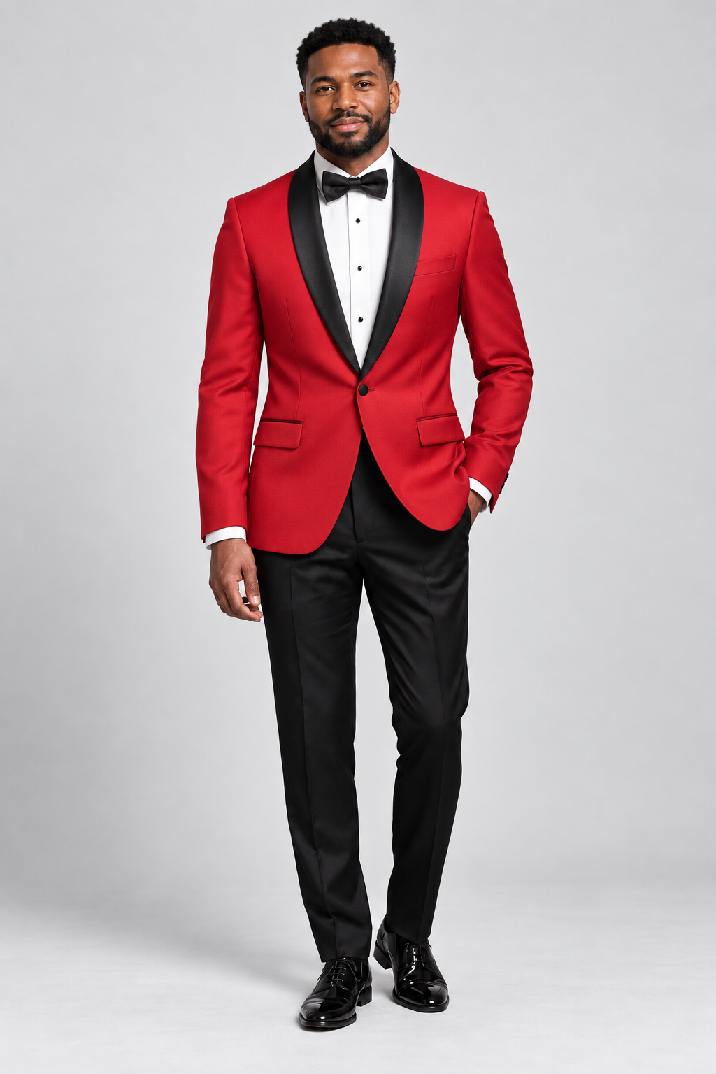 Vinci TSS Red/Black two-piece slim-fit tuxedo on model against gray studio background